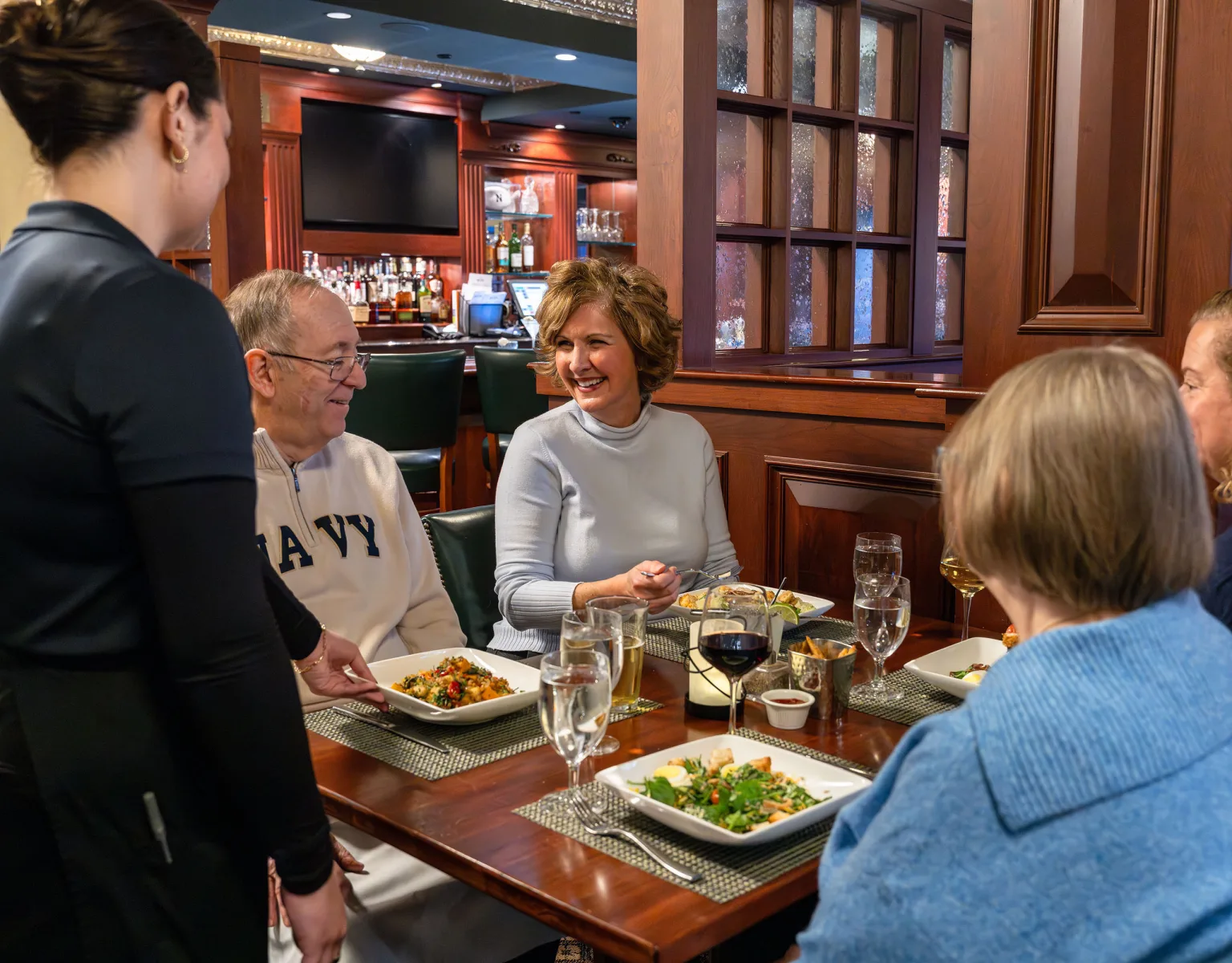 A group of women enjoying dinner