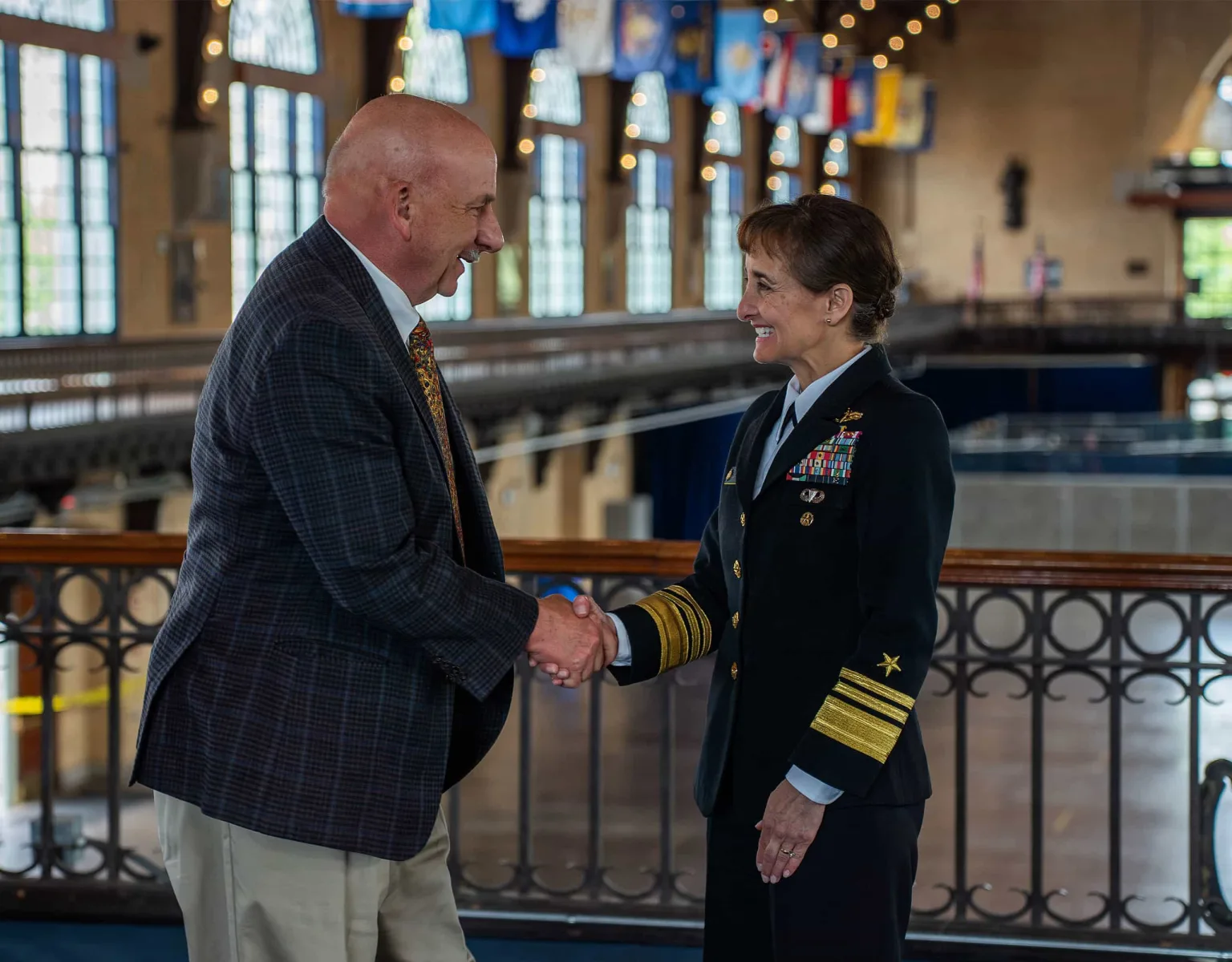 A man and woman shaking hands