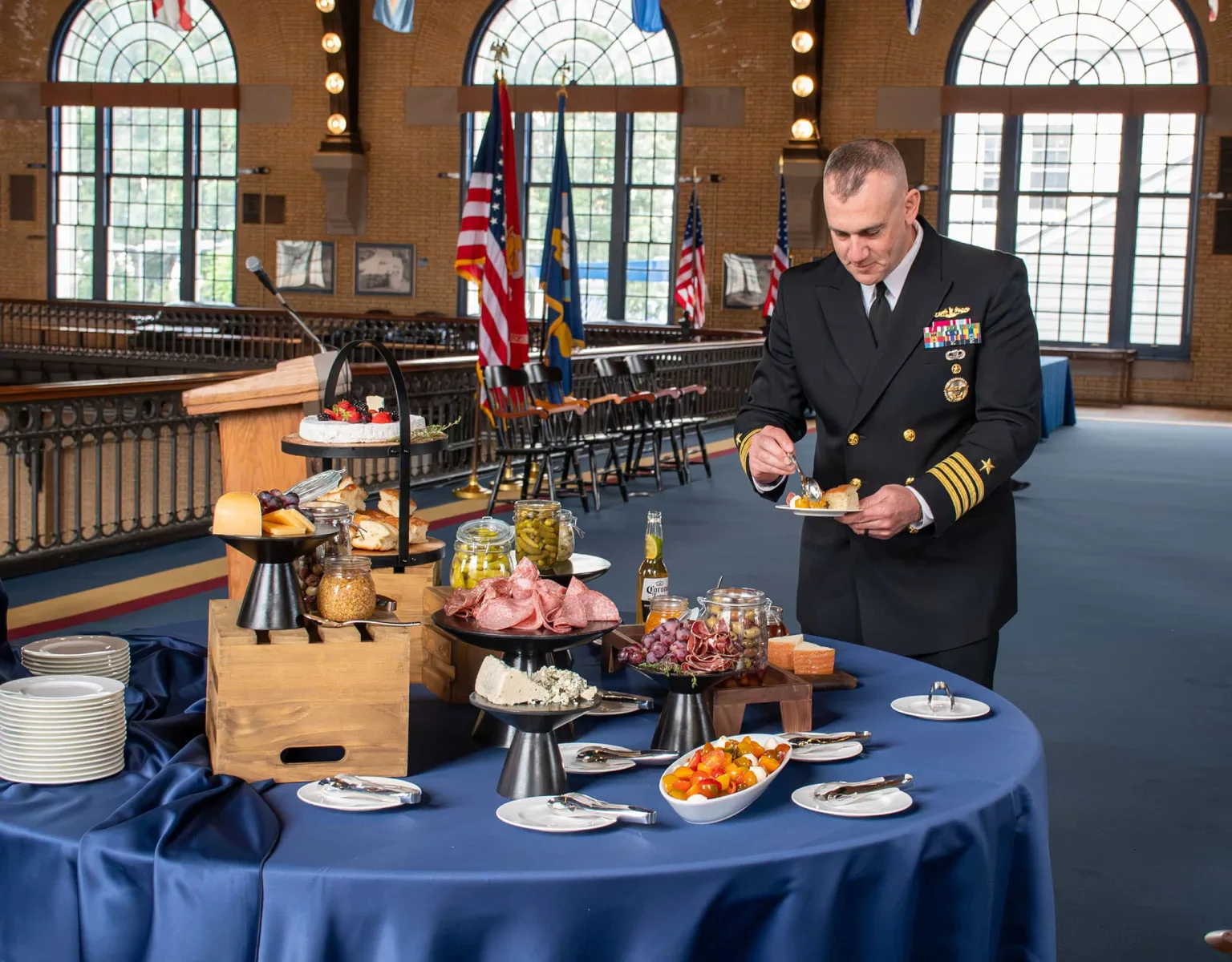 A man at a buffet in the Class of ‘53 Deck