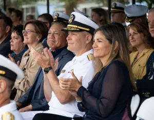 A Navy veteran and his family at an event