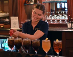 A bartender making cocktails