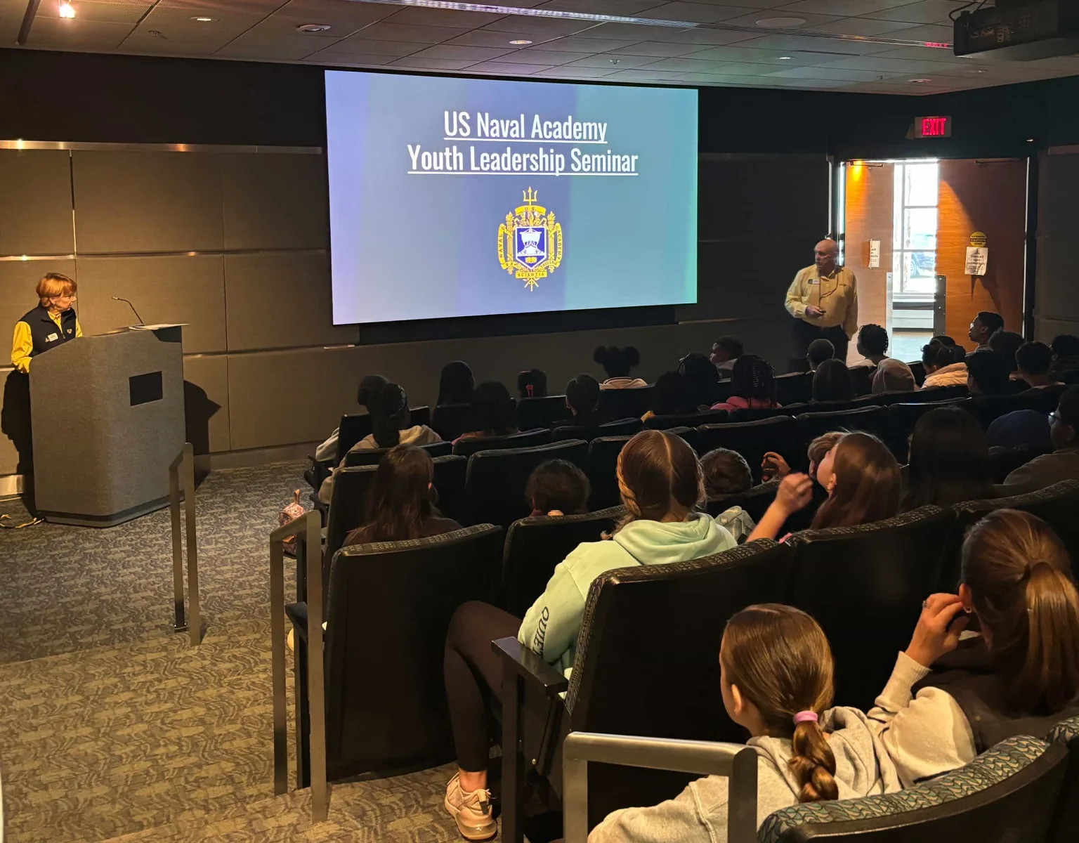 A presentation inside the Naval Academy Visitor Center theater