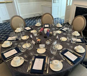 A table with place settings before a banquet