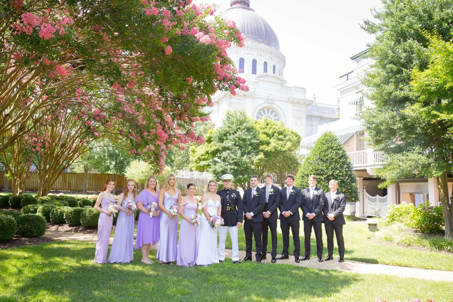 A wedding party outside of the USNA chapel