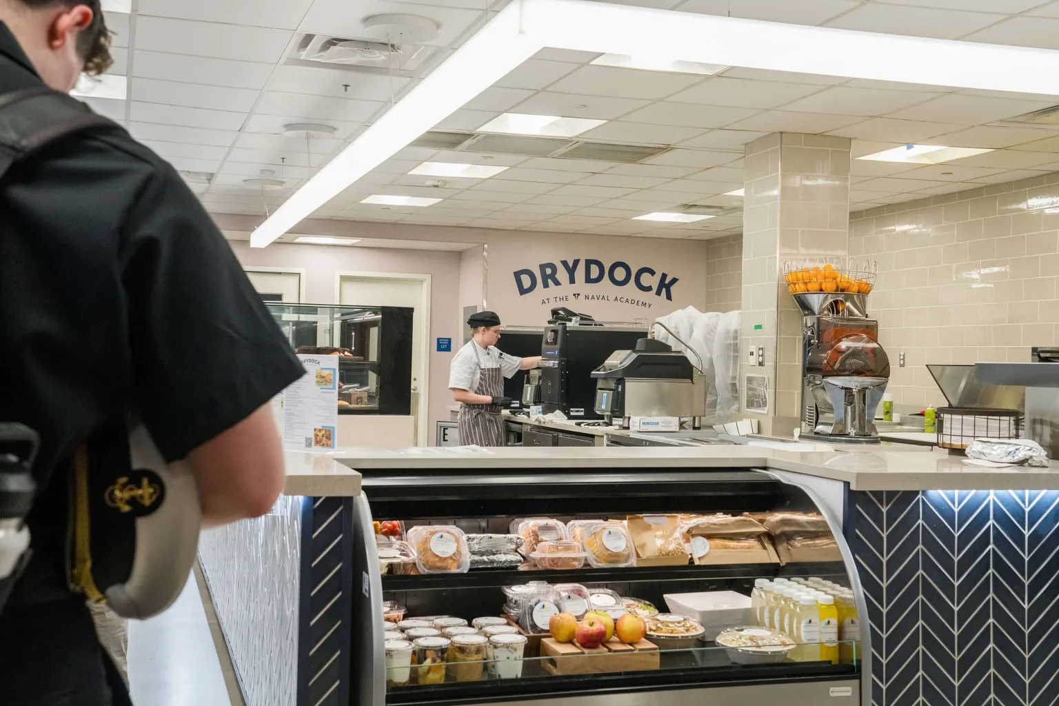 A Drydock employee preparing a meal